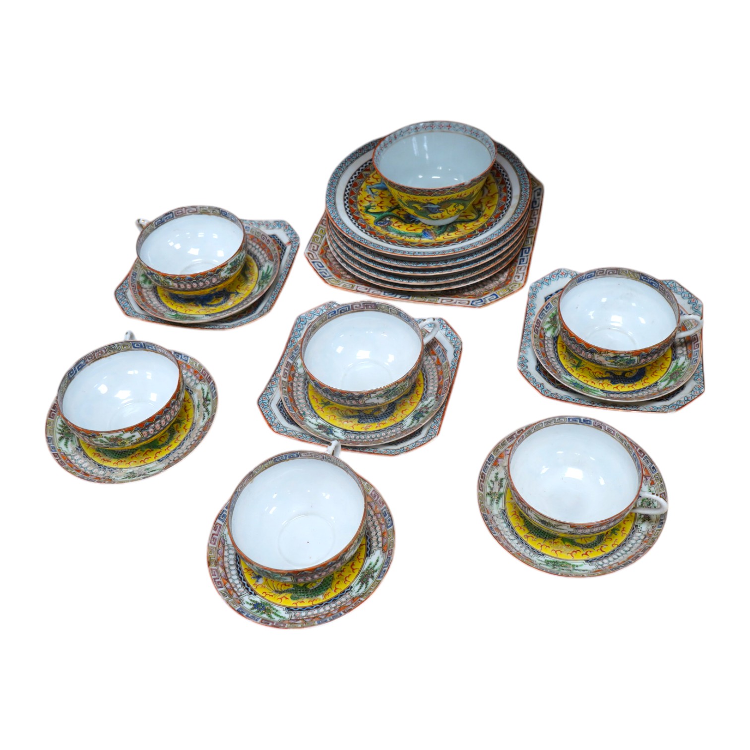 An early 20th century Chinese eggshell porcelain part tea set, with a yellow ground and coloured dragons (22). Condition - cups have slight chipping to top edges